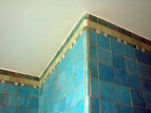 eltham-palace-bathroom-blue-tiles-and-banner